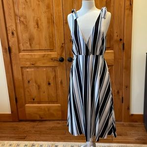 Ali and Jay dress. Worn once to a wedding and dry cleaned. Size M.